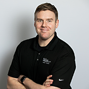 Headshot of Travis Lambright
