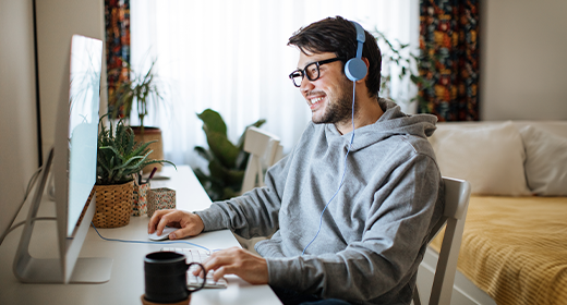 young adult attending a virtual class_520x280