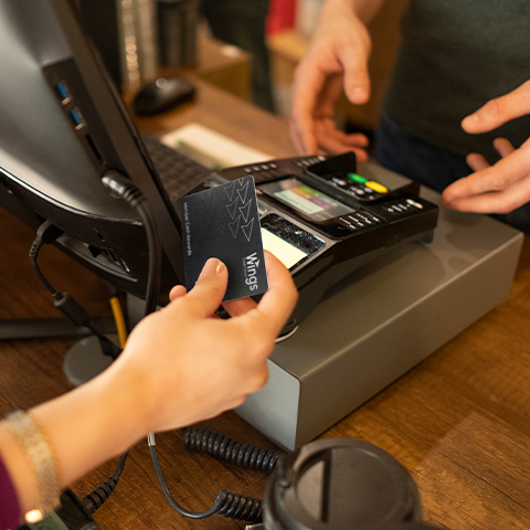 member paying with their member cash rewards card_480x480