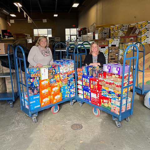 wings volunteers wiht food donations